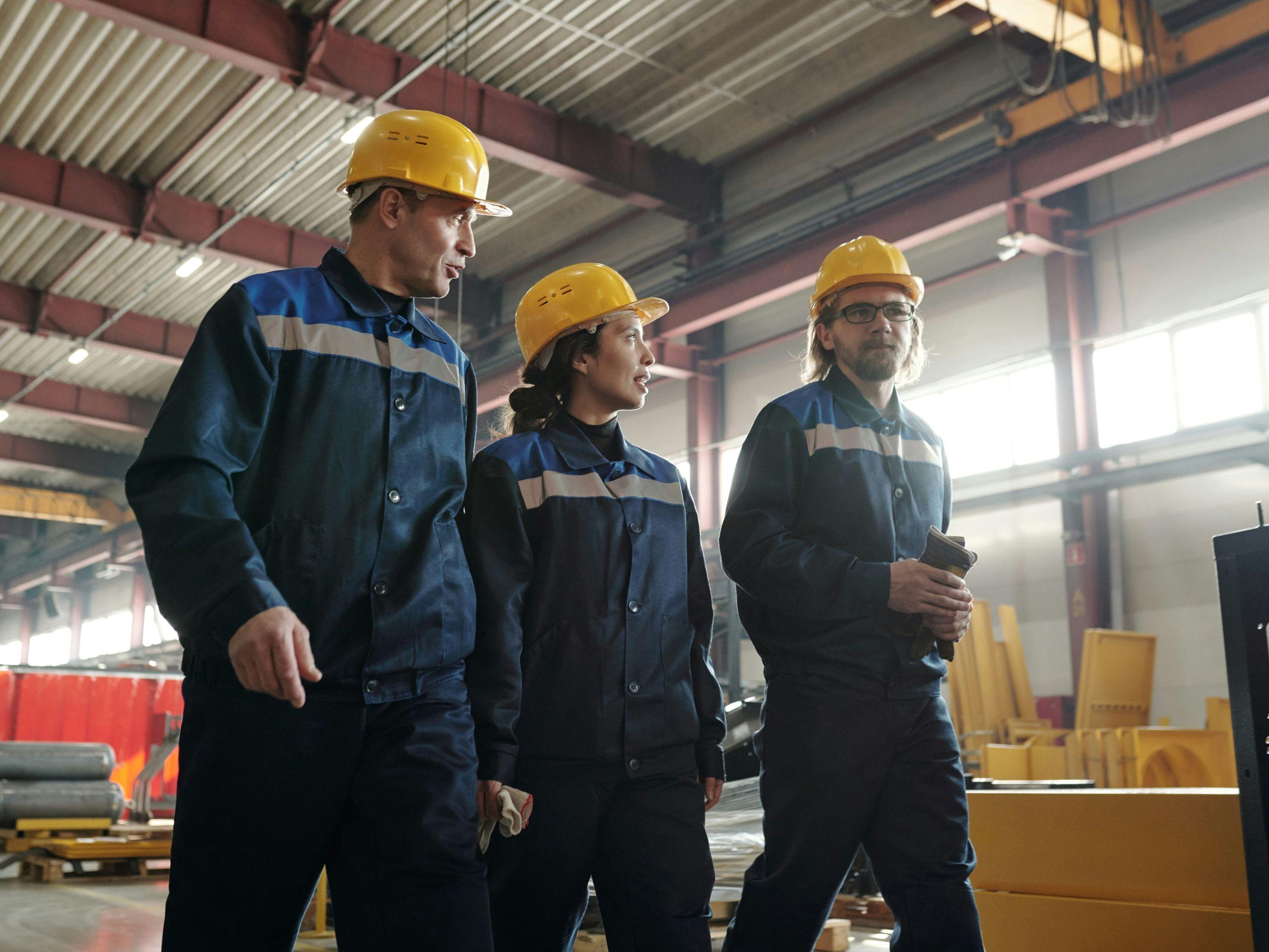 Polytronix careers banner, showing team members in a manufacturing environment.